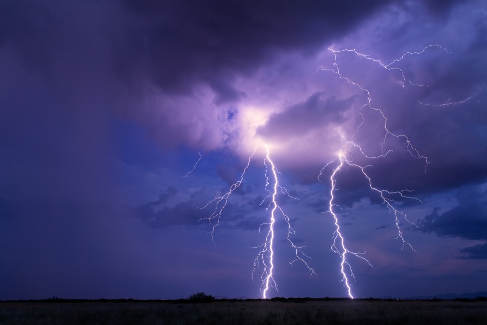 These two bolts almost appear to be mirror images of each other at first glance. Of course they are very different...but it's what fun about lightning photography. Finding the hidden shapes and nuances to what you capture.