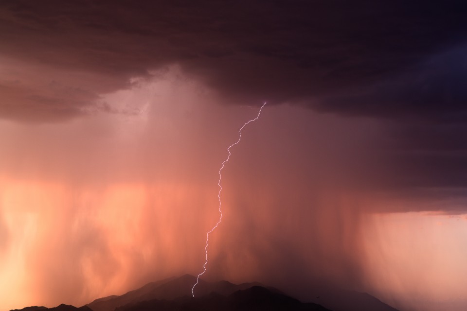 A lone bolt of lightning strikes the Sierra Estrella Mountains northwest of Maricopa, AZ. This downpour was awesome to watch as it just cascaded off the mountains.