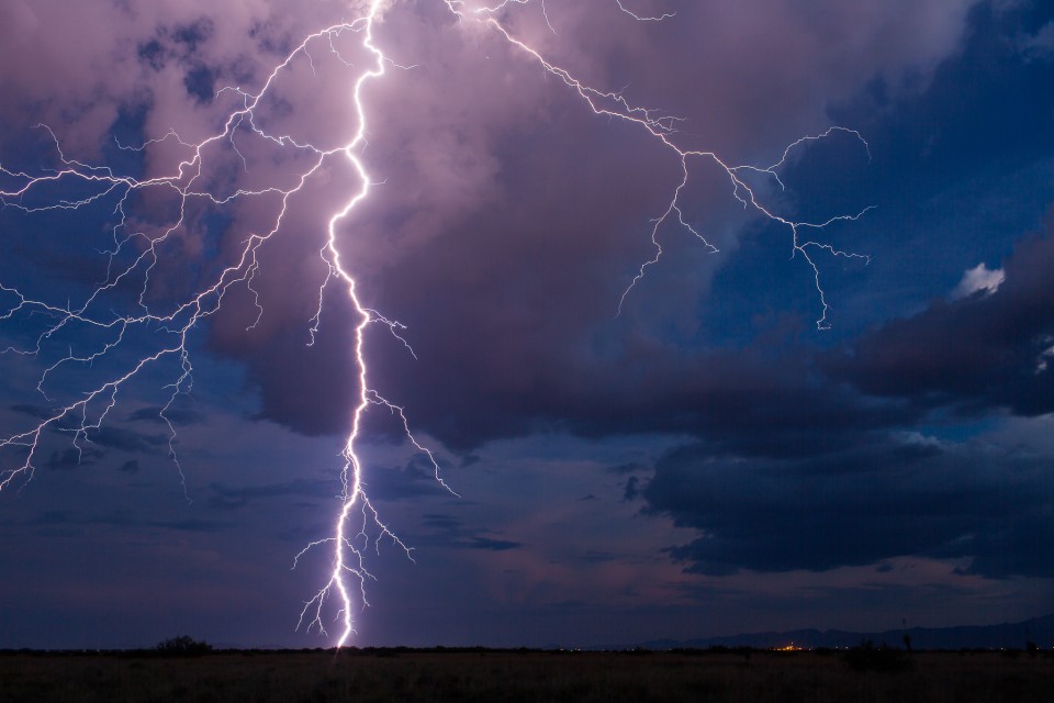 Sometimes it's obvious where you aim your camera when you photograph lightning in Arizona, mainly near the rain shaft is generally where you'll see the most. But when one fires behind it and it's super close...you turn your camera and hope to get lucky again. I caught two more, this was one. A gorgeous, clear air strike out over the dry lake bed near Willcox, Arizona on July 11th, 2015.