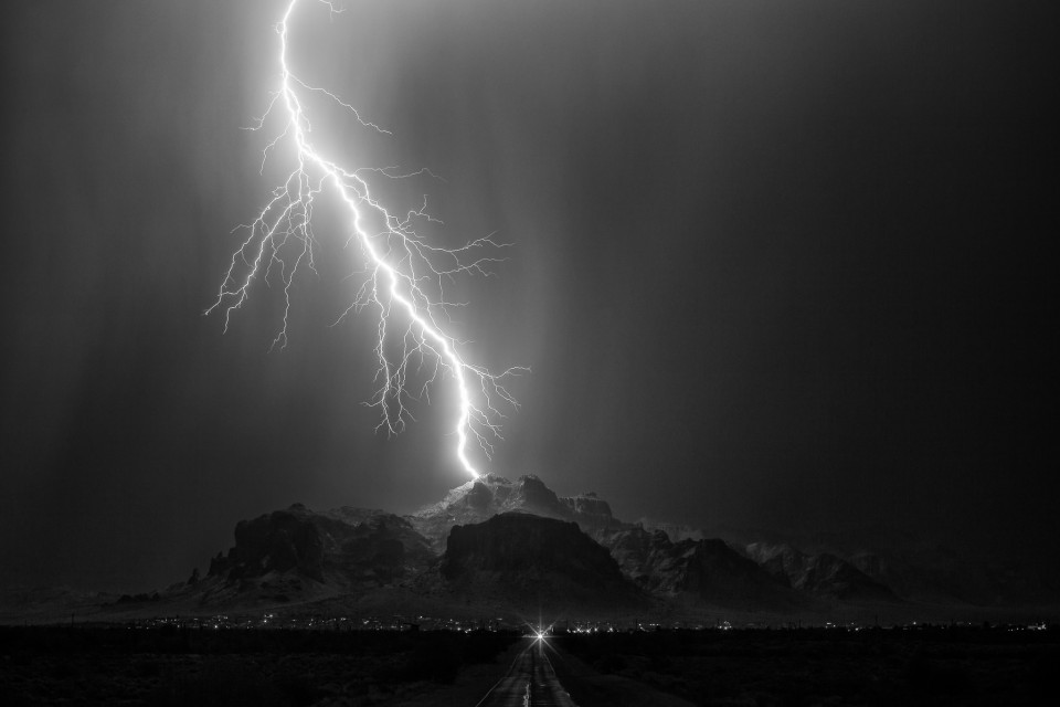 An early morning thunderstorm over the Superstition Mountains on July 3rd delivered a couple of magical lightning strikes. This one in particular is one of my favorites...a single, powerful bolt landing at almost the highest point of the mountain. I'm a huge comic book fan and if anything looked like the arrival of Thor from Asgard, this is it.