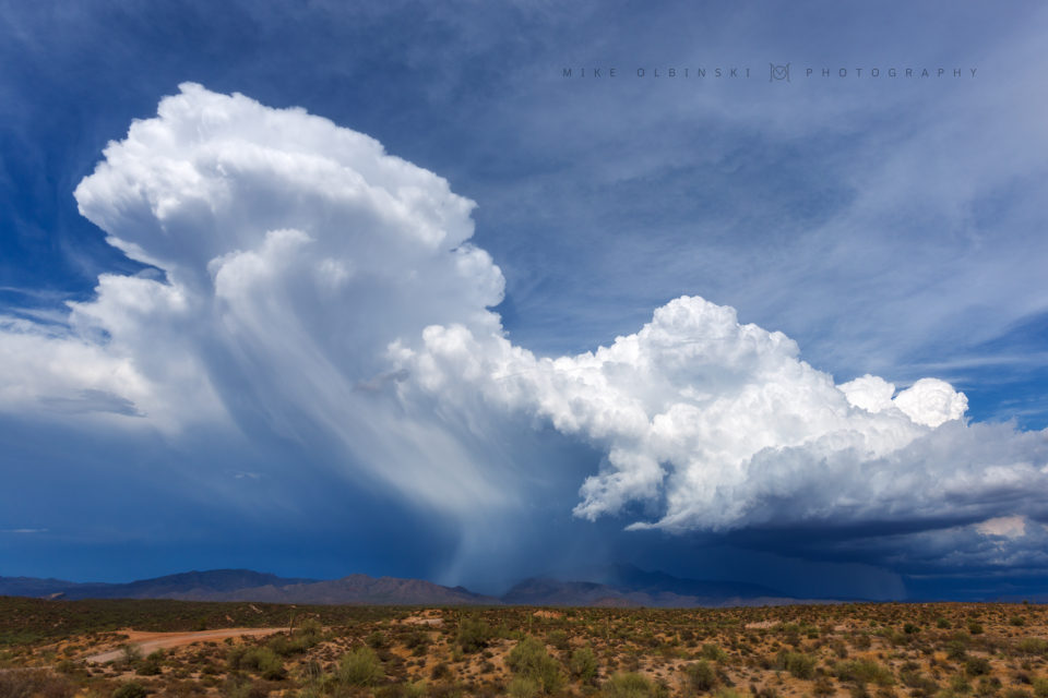 An incredibly cooll scene out at the Four Peaks on July 1st, 2016. Strong winds push a dumping hail core way out ahead of the updraft and on top of the Four Peaks Mountain Range.