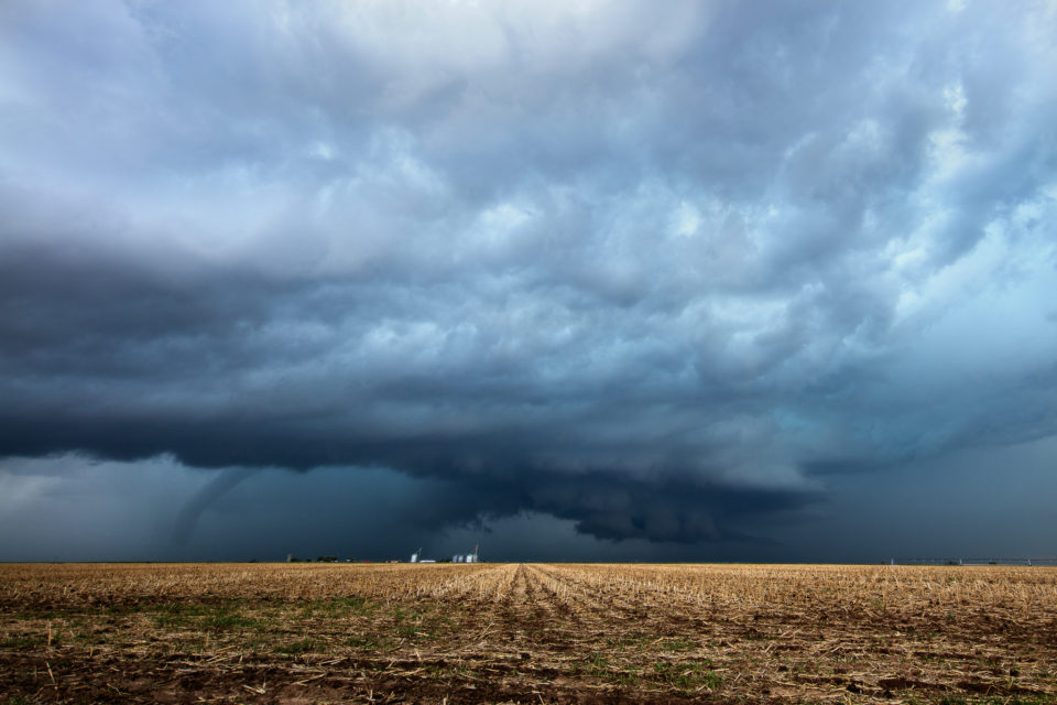 A tornado developed in the rain of this supercell and slowly emerged as it moved in the completely opposite direction from the storm itself.