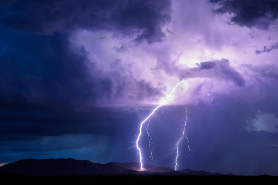 A gorgeous couple of lightning strikes hit the Sand Tank Mountains just after sunset on July 1st, 2016