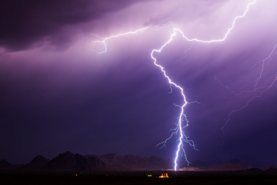 A bolt of lightning hits in front of the Gila Bend Mountains on August 18th, 2016