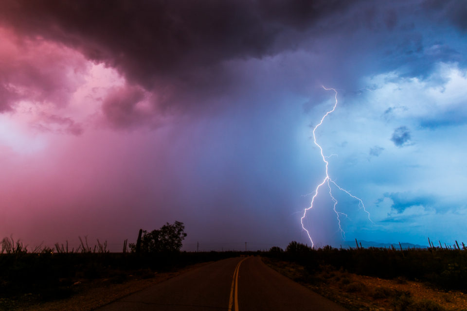 Yesterday was a crazy chase, ended up in a little community east of Ajo called Maish Vaya at sunset and completely surrounded by exploding thunderstorms and insane colors in the sky. It was unreal. This was looking north and is the only bolt I caught in this direction as I had less than 10 minutes before it started pouring. Spent the night in Green Valley and am now in Nogales watching the wash through town flow a bit before heading home early this afternoon.